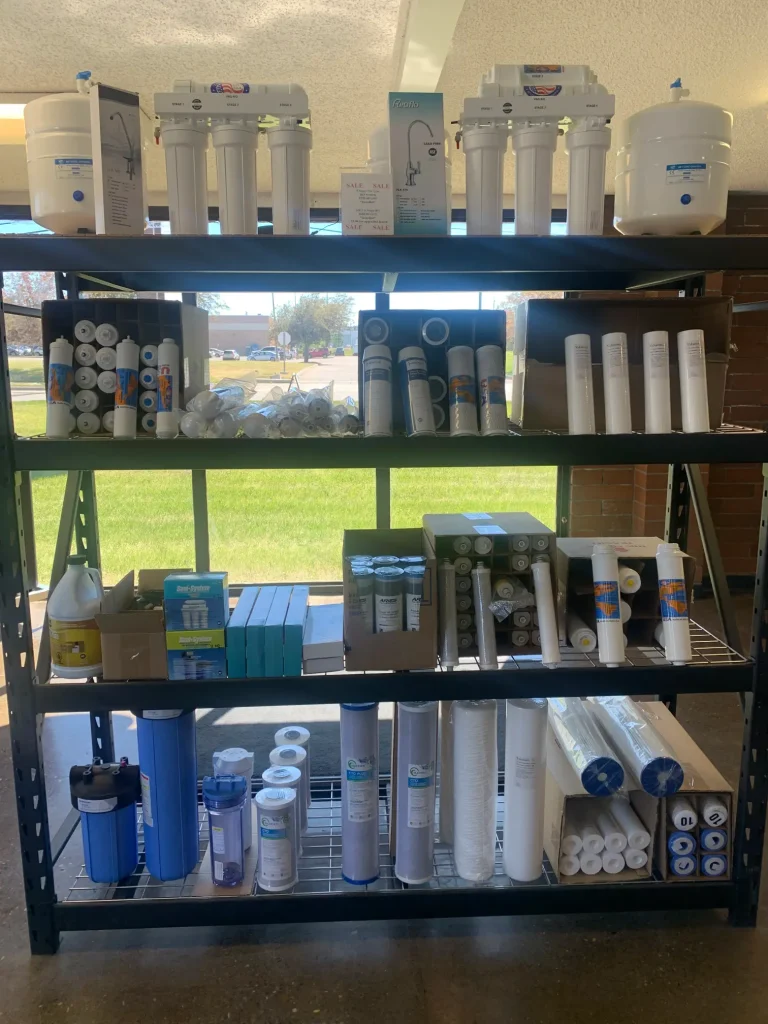 Big Blue fluoride removal filter housing mounted on wall